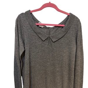 Vintage Lacoste button down the back long-sleeve metal emblem on the bottom